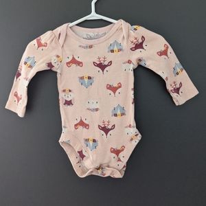 Blush pink forest animal print long sleeve onesie